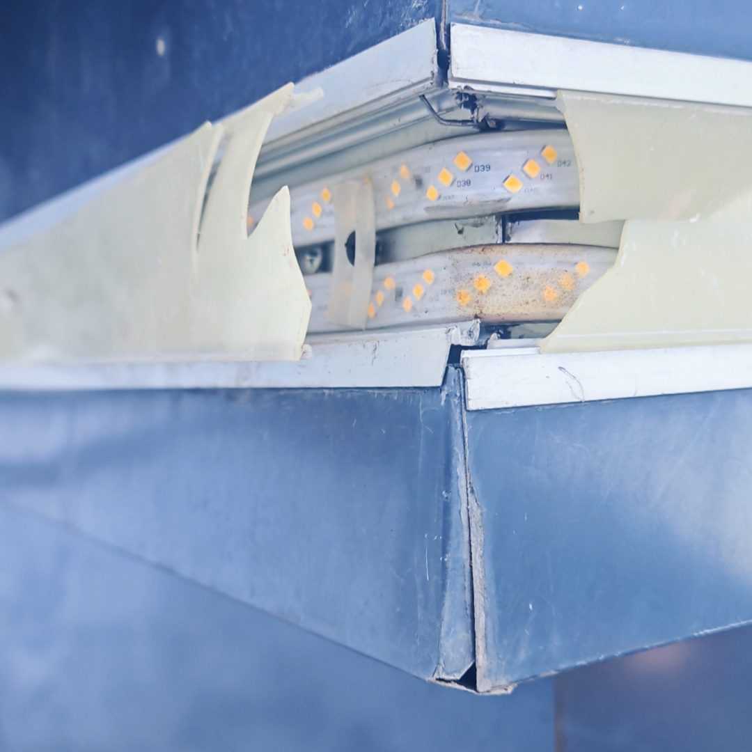 Cracked polycarbonate LED diffuser caused by cold weather and UV exposure